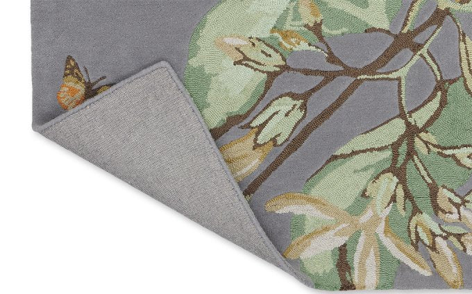 Wedgwood Hummingbird Grey 37804 rug corner turned to show the backing