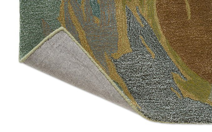 Harlequin Saltillo Forest 144607 rug corner turned to show the backing