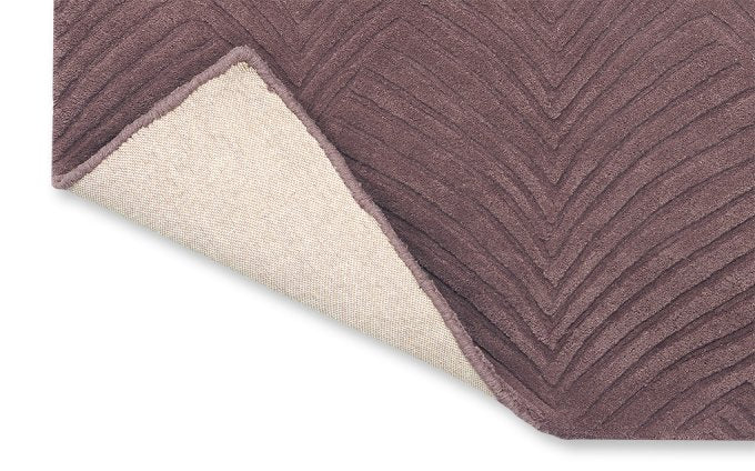 Wedgwood Folia 2.0 Mink 38902 rug corner turned to show the backing