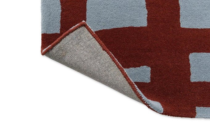 Scion Arlo Brick rug corner turned to show the backing