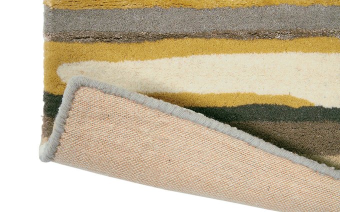 Sanderson Elsdon Linden 44006 rug corner turned to show the backing