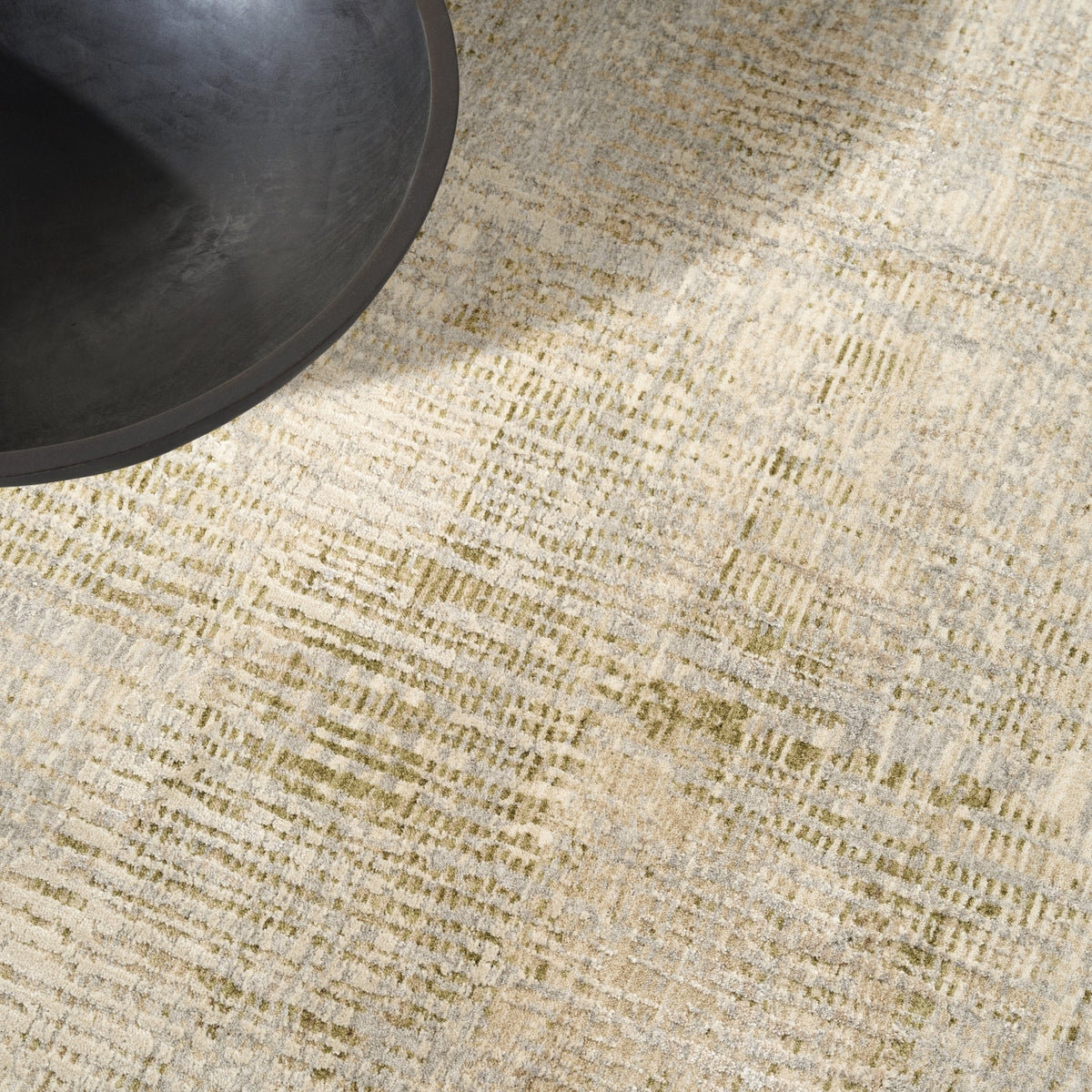 Calvin Klein Drift DRF02 Grey rug styled in a room setting