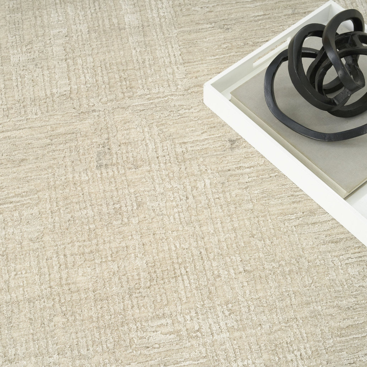 DKNY Madison Square MSQ01 Ivory Beige rug styled in a room setting