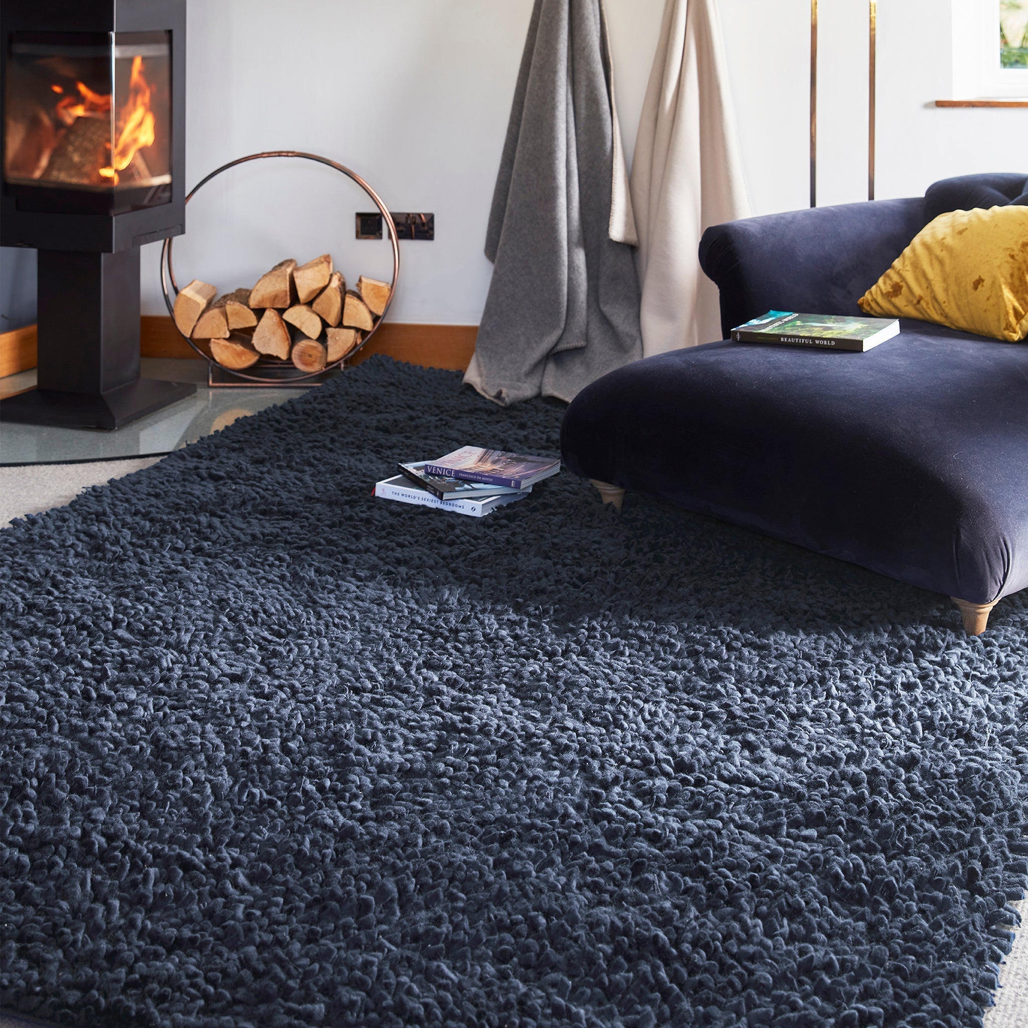 Maine Midnight hand-woven wool rug styled in a room setting