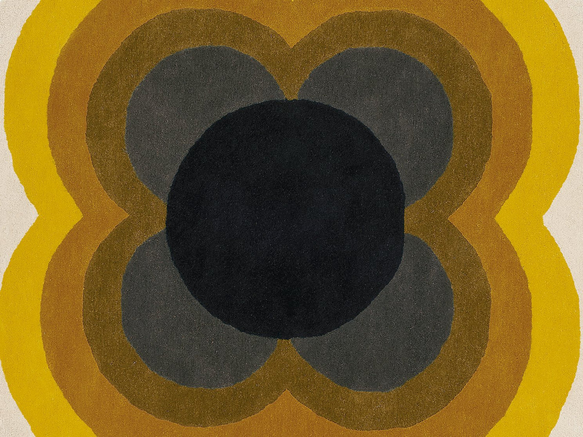 Orla Kiely Sunflower Yellow Round 60006 rug styled in a room setting