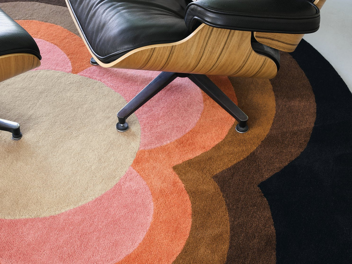 Orla Kiely Sunflower Pink Round 60005 rug styled in a room setting