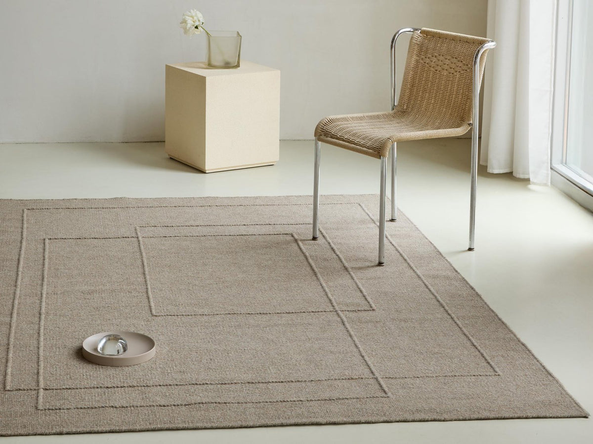Senso Planes Soft Taupe rug in a room setting