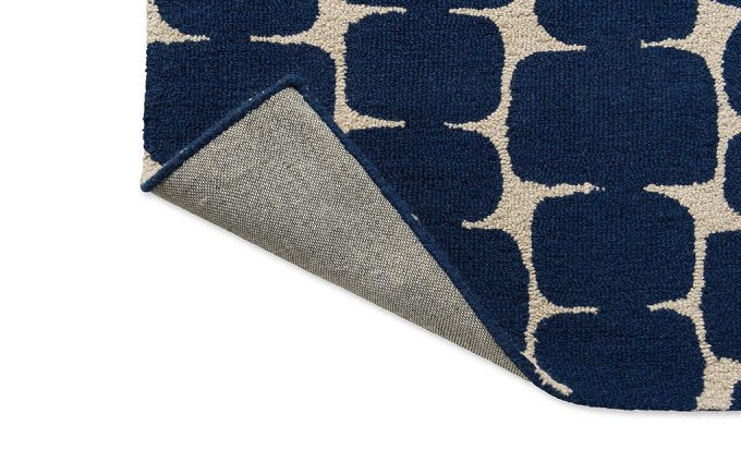 Scion Little Lohko Indigo rug corner turned to show the backing
