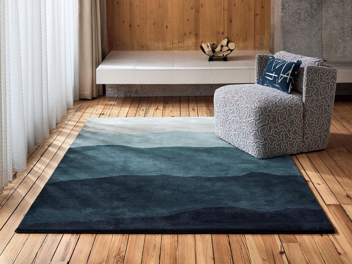 Harlequin Sedimentary Midnight 141005 rug styled in a room setting