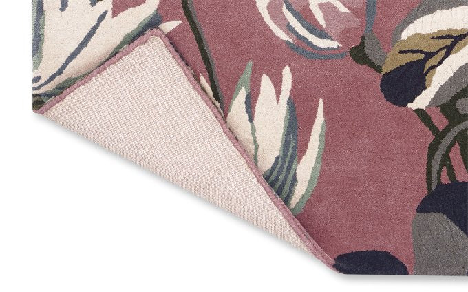 Wedgwood Waterlily Dusty Rose 38602 rug corner turned to show the backing