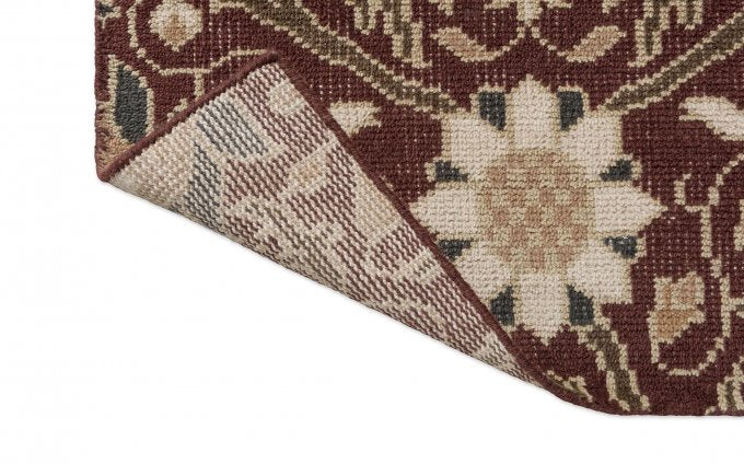 Morris & Co Montreal Russet rug corner turned to show the backing