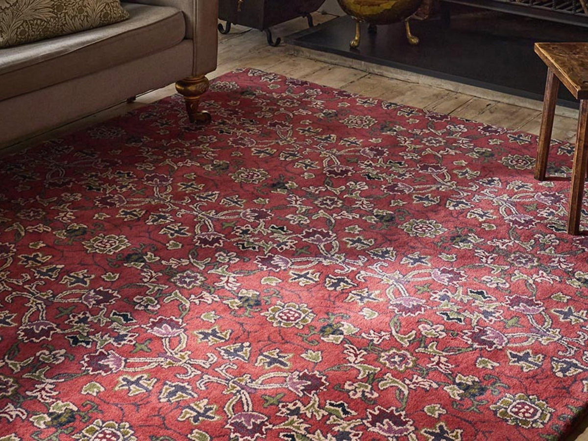 Morris & Co Persian Scroll Plum rug styled in a room setting