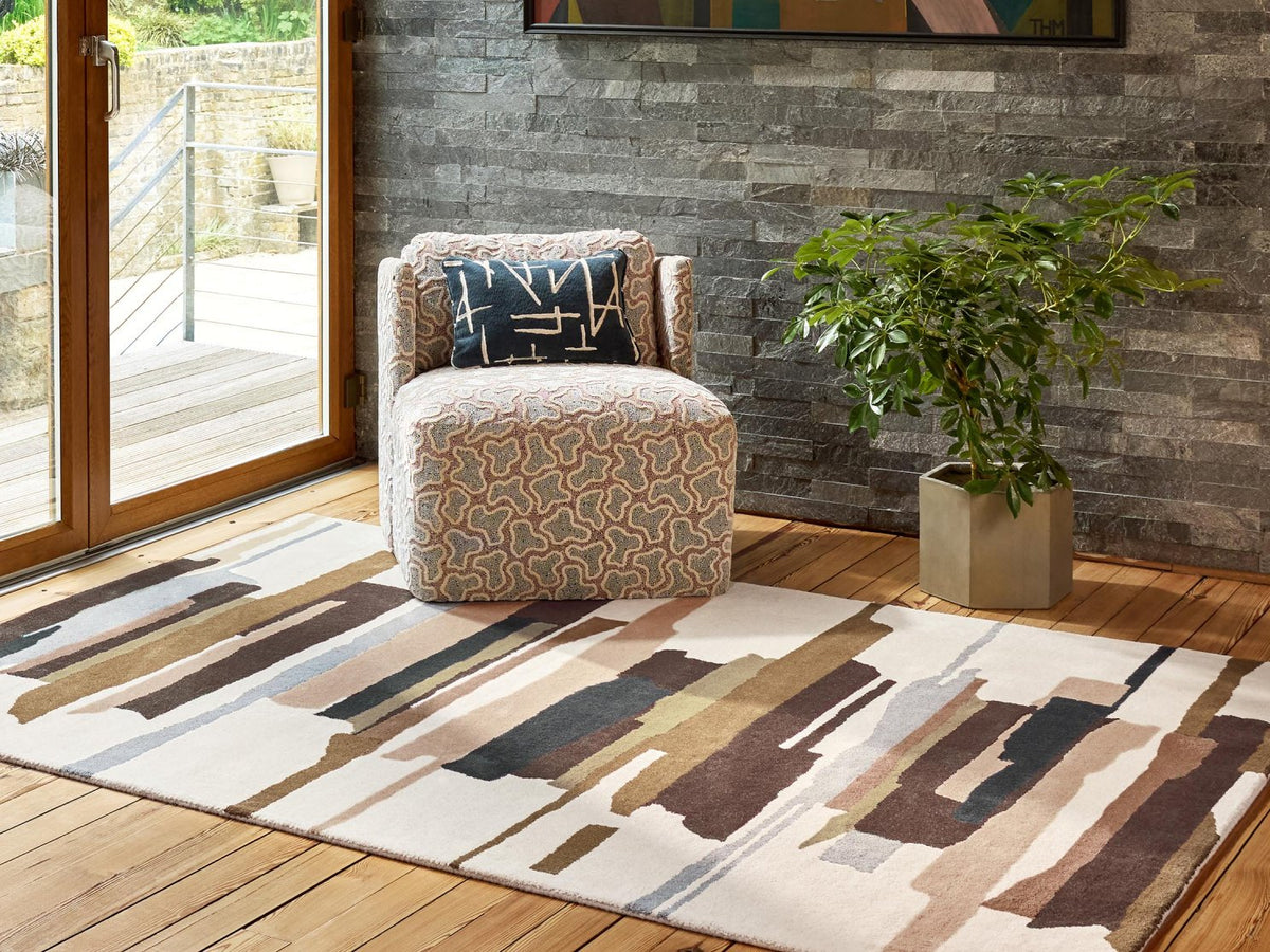 Harlequin Zeal Taupe 43001 rug styled in a room setting