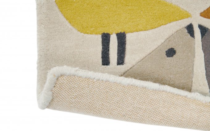 Scion Lintu Dandelion rug corner turned to show the backing
