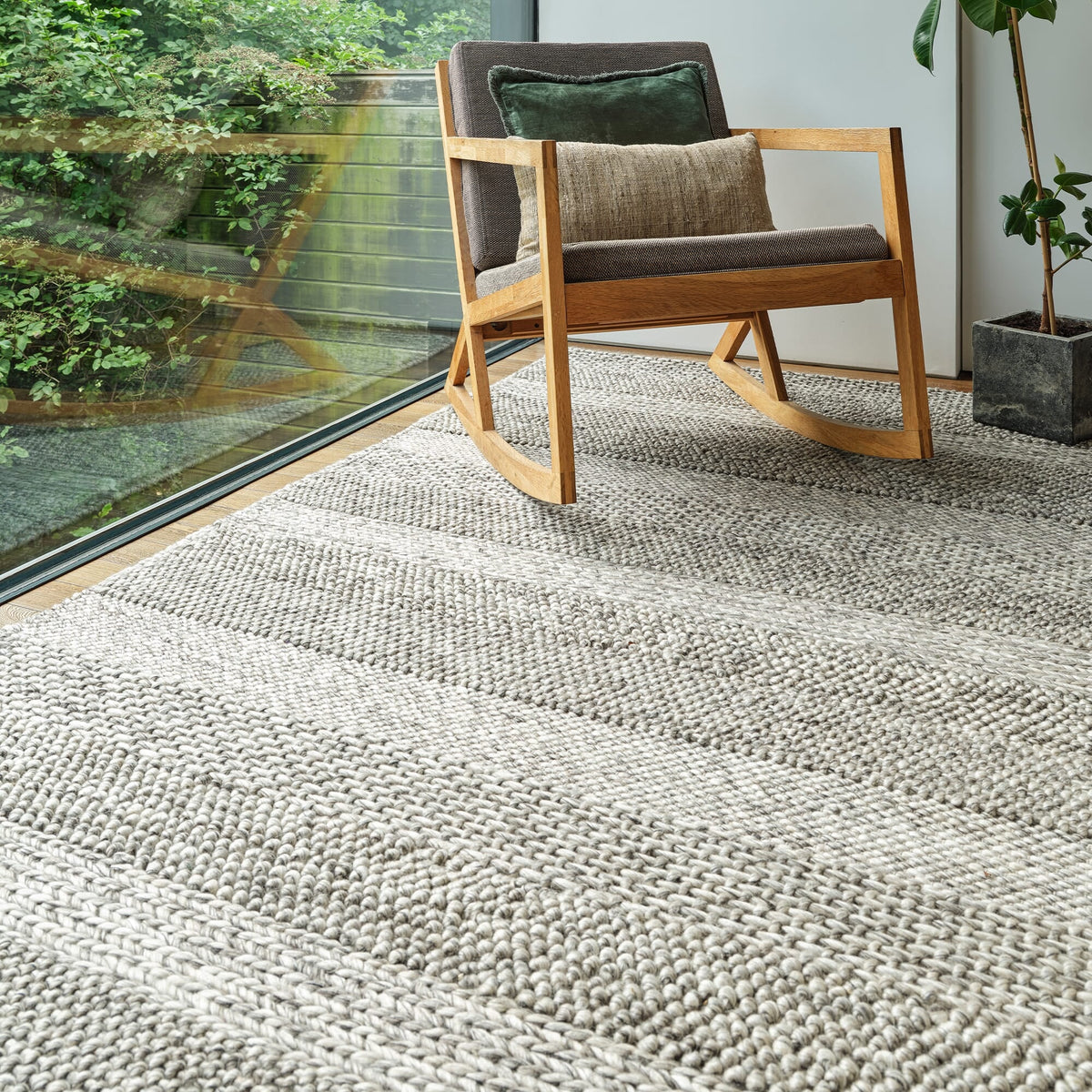Katherine Carnaby Coast Grey Marl Stripe CS07 rug in a living room