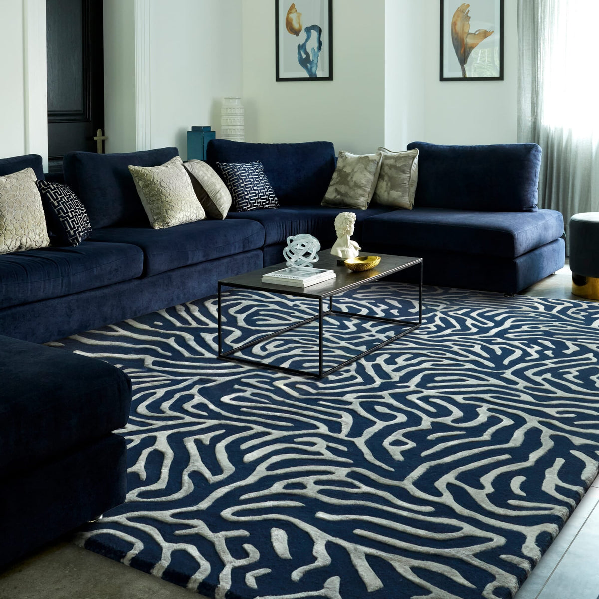 Katherine Carnaby Coral Blue rug in a living room
