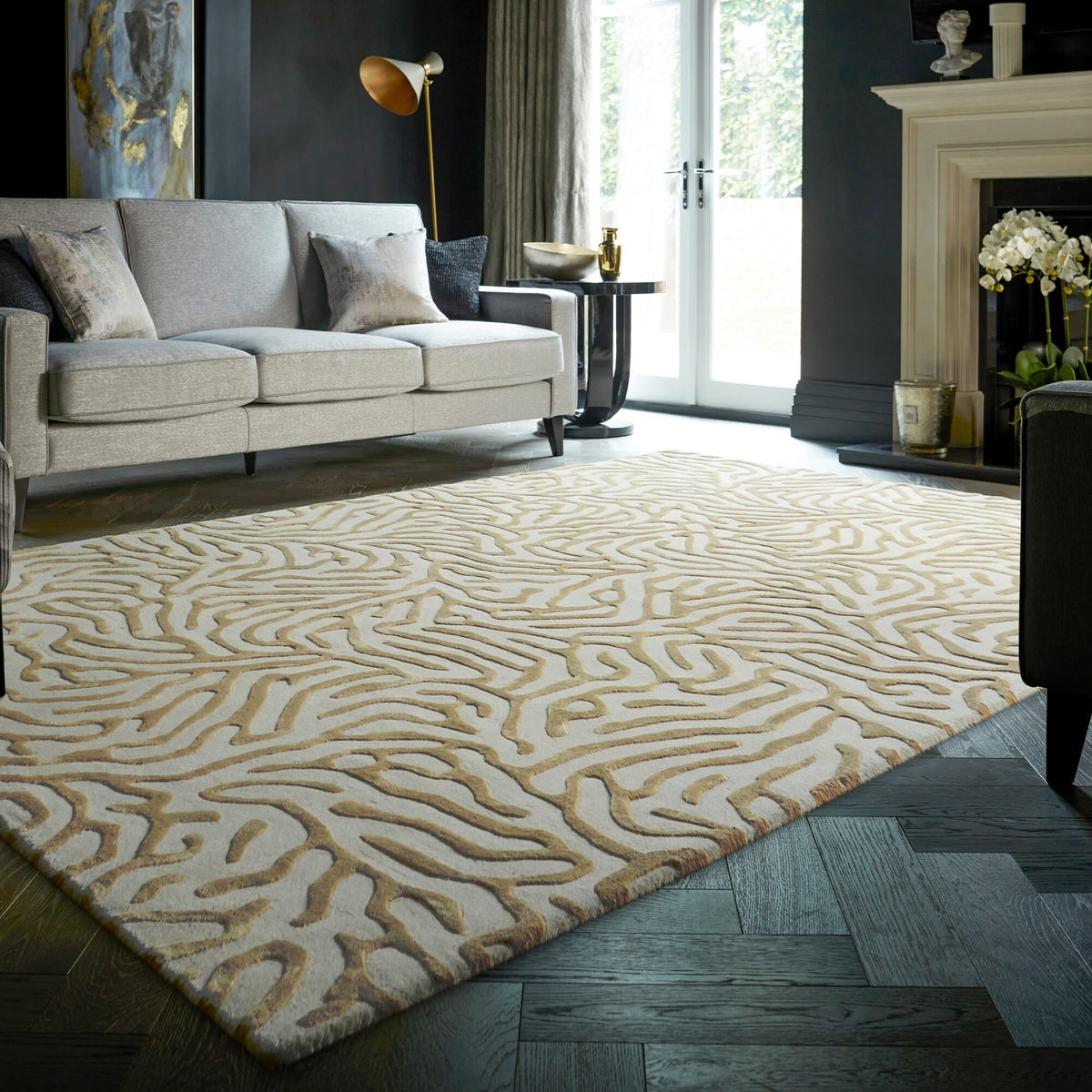Katherine Carnaby Coral Gold rug in a living room